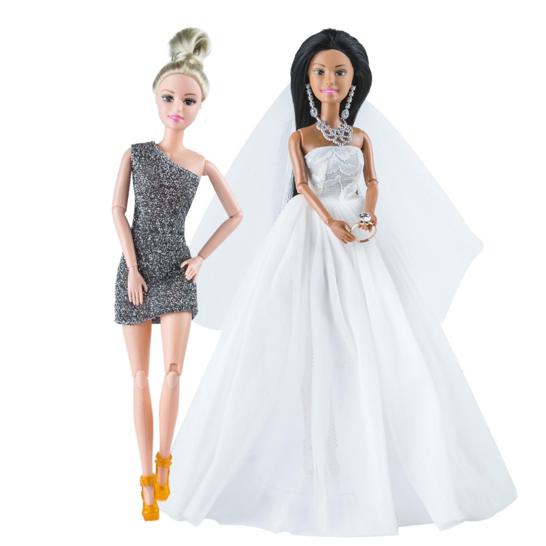 Fashion doll & Barbie dressed in our wedding outfit and honeymoon outfit clothing set.